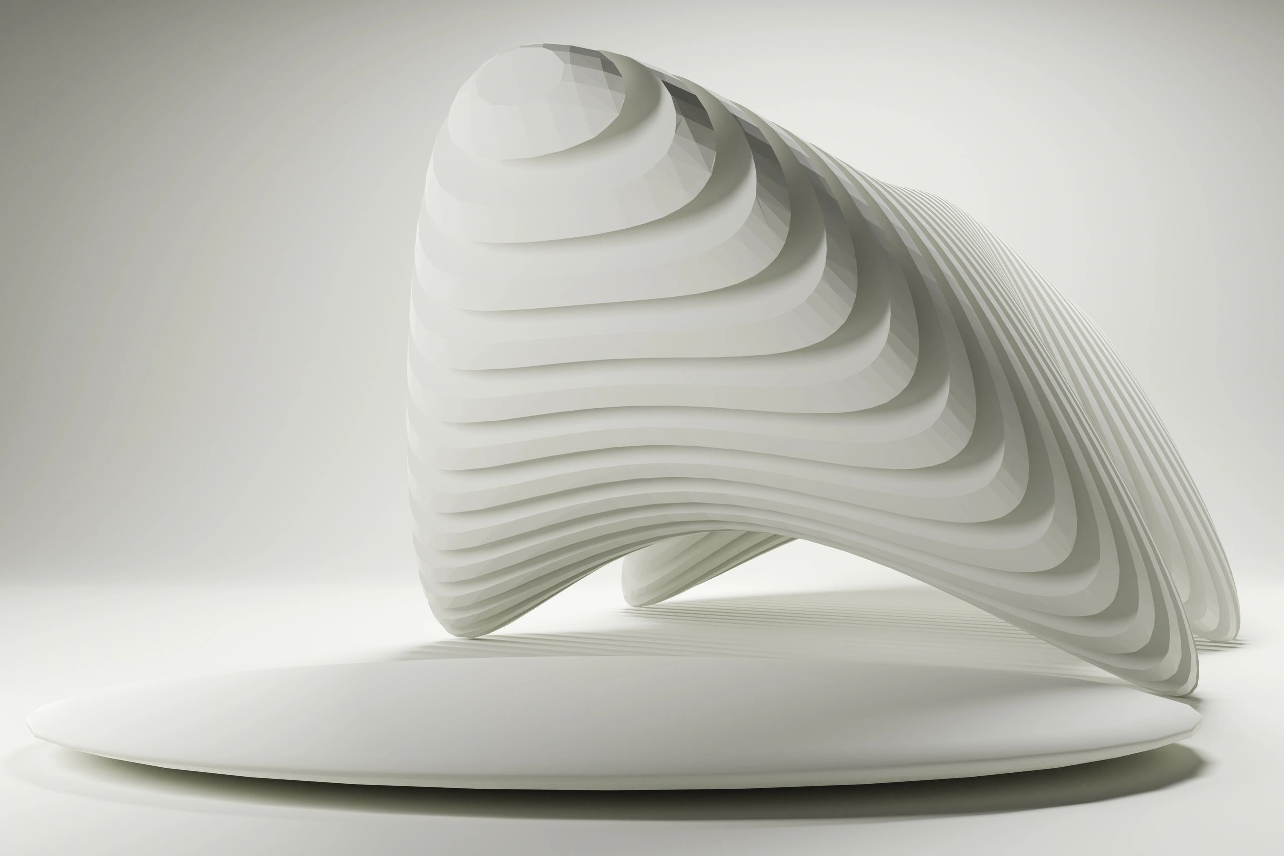 Abstract white sculptural form on a circular plinth